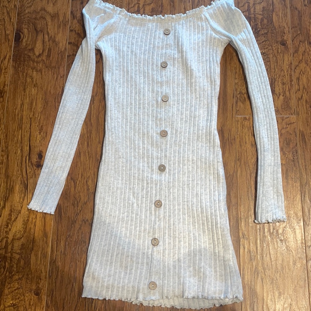 Light grey sweater-ish dress. Long sleeve off the shoulder.